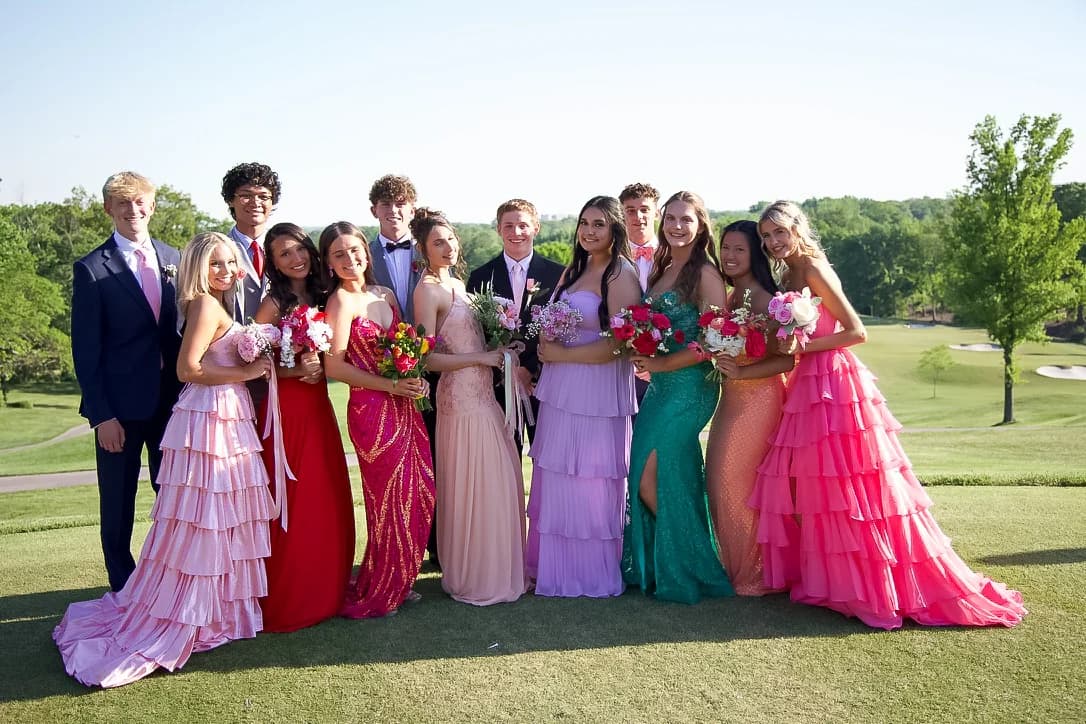A group of friends in their prom suits and dresses